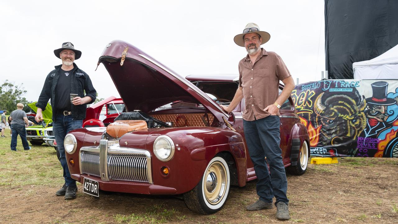 Derek Stewart (left) and Chris Anscombe with Chris's 1942 Ford Tudor on display at Meatstock at Toowoomba Showgrounds, Saturday, April 9, 2022. Picture: Kevin Farmer