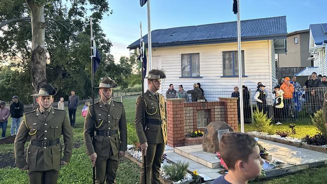 Geoff Benson announces last Anzac Day Dawn Service at Queensland Country Women’s Association hall memorial in Upper Coomera. Photo: Blair Wilkes