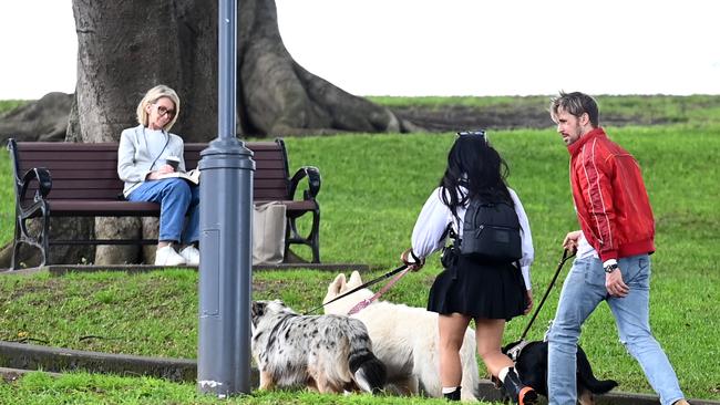 Gosling is seen walking an Australian Kelpie, alongside an unknown female actor with two dogs. Picture: NCA NewsWire