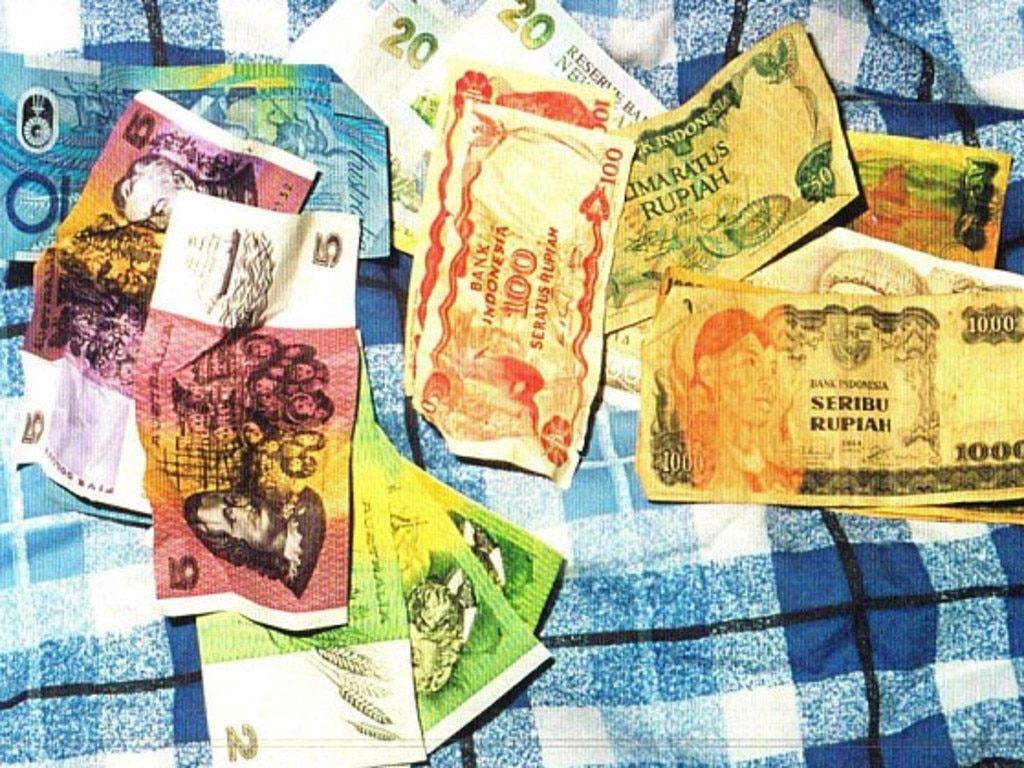 Currency found in Milat's house including Indonesian Rupiah probably taken from Gabor Neugebauer and Anya Habschied.