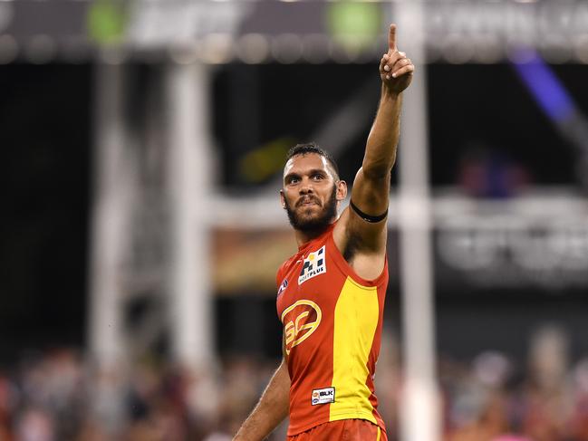 Suns player Harley Bennell reacts after the round 21 AFL match between the Gold Coast Suns and the Essendon Bombers at Metricon Stadium on the Gold Coast, Saturday, August 22, 2015. (AAP Image/Dave Hunt) NO ARCHIVING, EDITORIAL USE ONLY