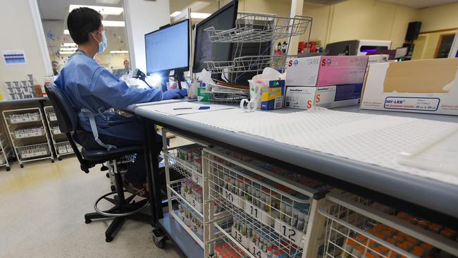 A medical scientist working on samples at the SA Pathology laboratory on Frome Rd, city. Picture: Mark Brake