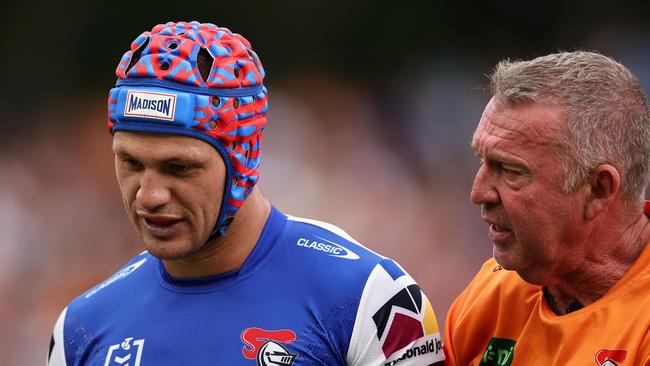 Kalyn Ponga leaves the field for an HIA during round 2.