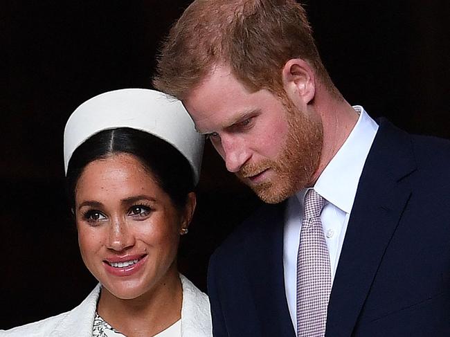 (FILES) In this file photo taken on March 11, 2019 Britain's Prince Harry, Duke of Sussex (R) and Meghan, Duchess of Sussex leave after attending a Commonwealth Day Service at Westminster Abbey in central London. - Britain's royal family on Sunday braced for further revelations from Prince Harry and his American wife, Meghan, as a week of transatlantic claim and counter-claim reaches a climax with the broadcast of their interview with Oprah Winfrey. (Photo by Ben STANSALL / AFP)