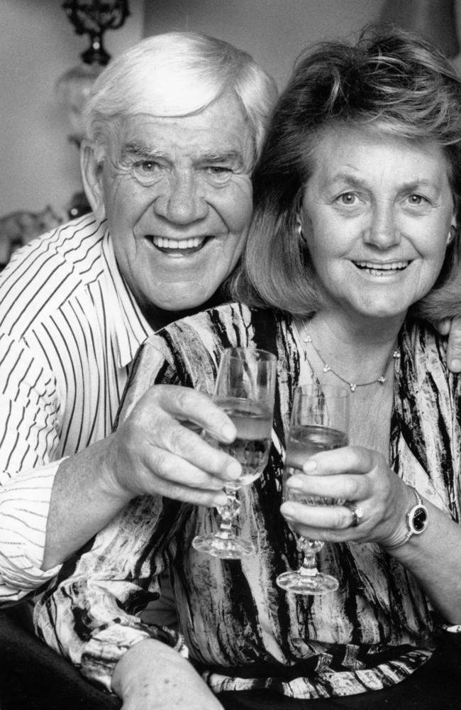 Lou Richards and wife Edna in 1990. Picture: Colin Bull