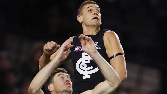 Liam Jones climbs over Jeremy Cameron. Picture: Michael Klein