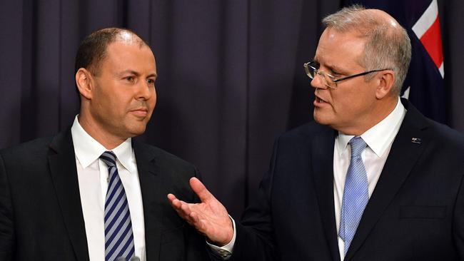 Treasurer Josh Frydenberg and Scott Morrison will deliver the Budget that will see millions of Aussies get some tax relief. Picture: Saeed Khan/AFP