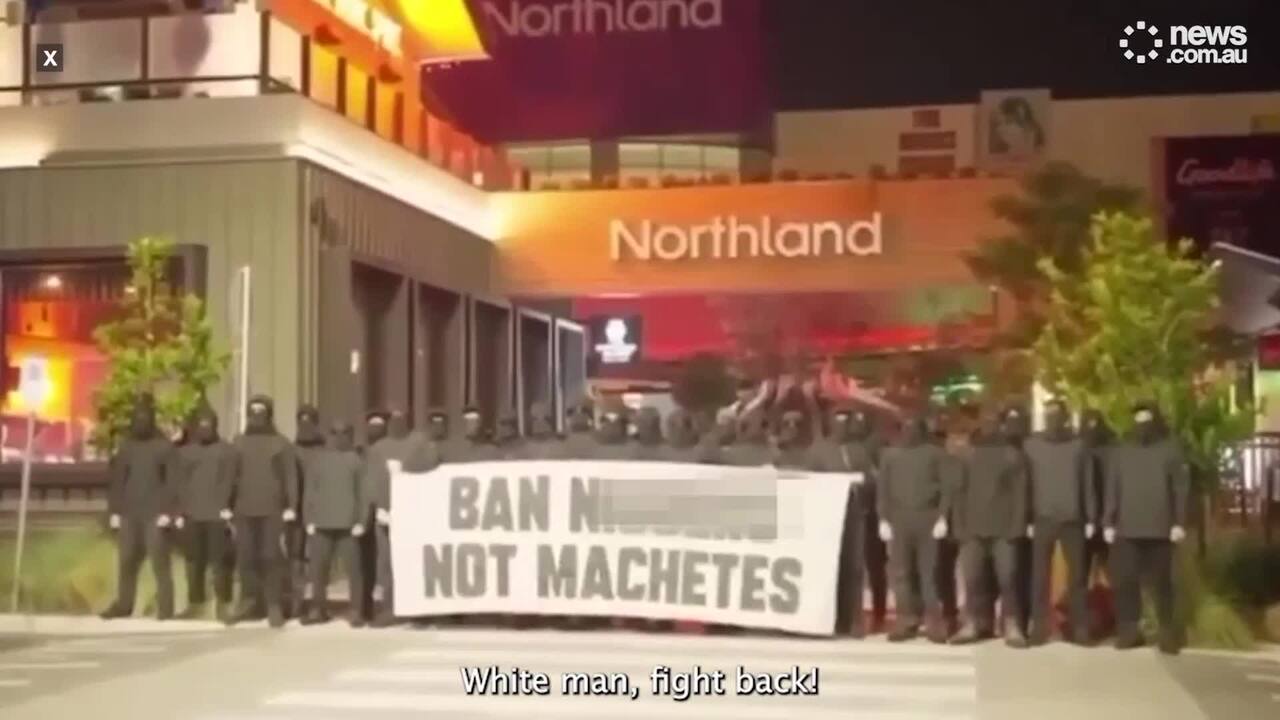 Racist banner outside Melbourne shopping centre