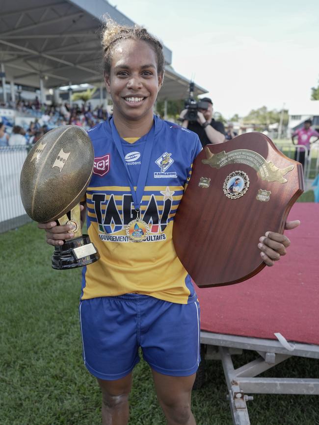 Genavie Tabuai from Kangaroos with the player of the grand final trophy and premiership. Picture: Nuno Avendano