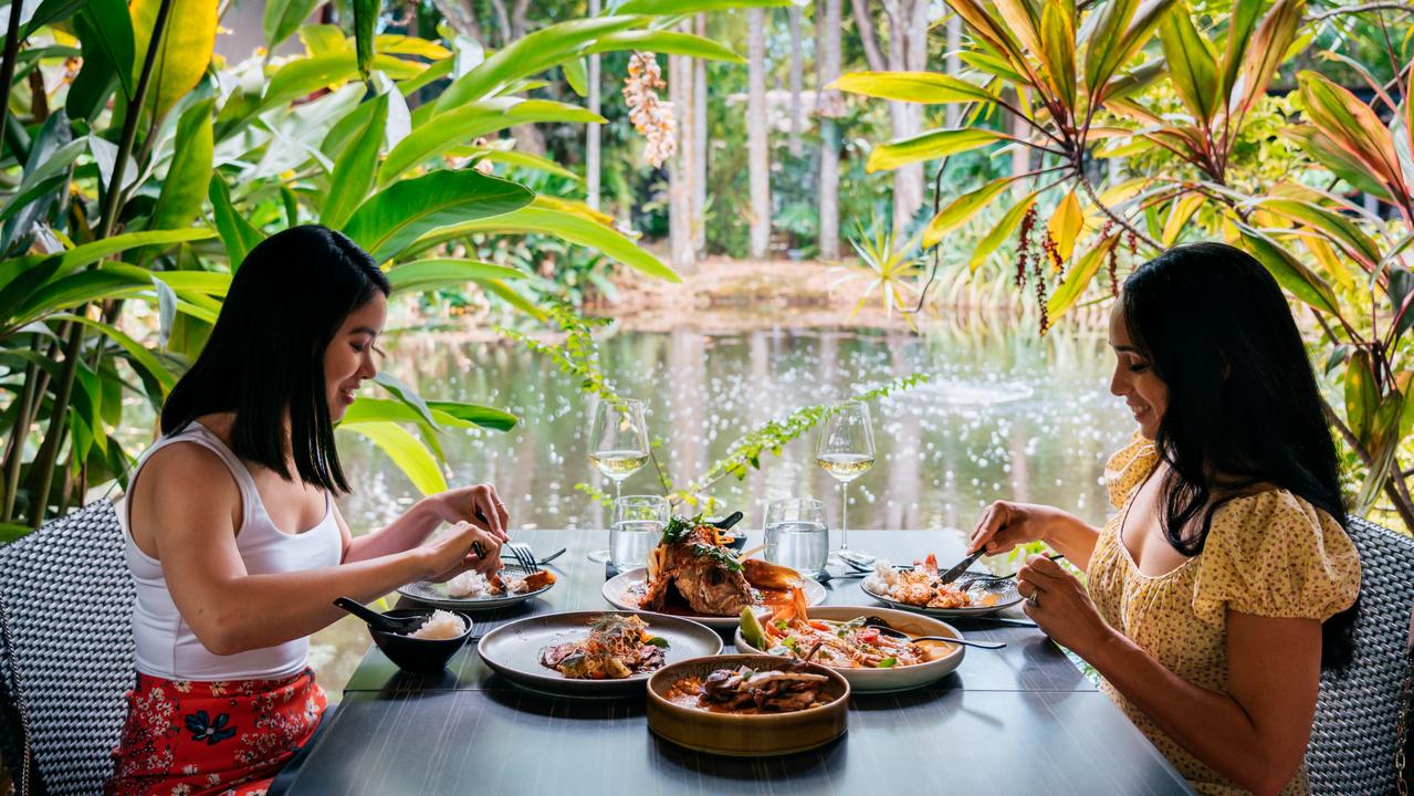 Enjoying a seafood lunch by the pond at Spirit House. Picture: Jesse Lindemann