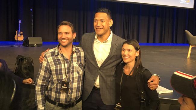 Israel Folau taking photos with fans before speaking at the Aus Christian Lobby's “Not Ashamed” conference at the International Convention Centre in Darling Harbour. Picture: Brenden Hills