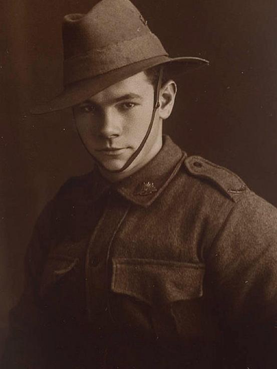 Private Cecil Boles: A young man with a piercing gaze.