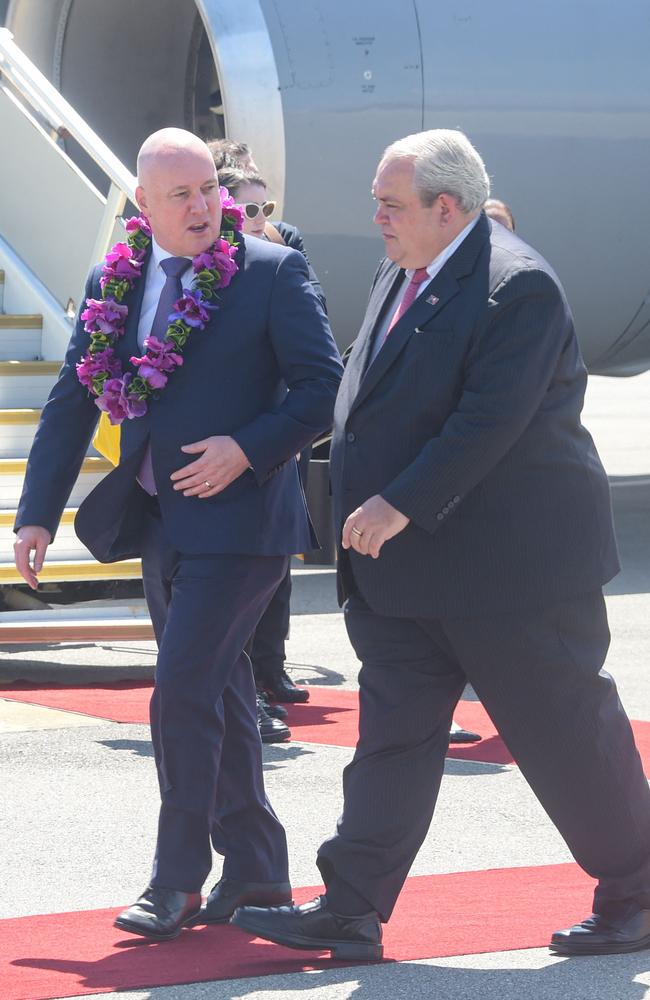 Papua New Guinea's Foreign Minister Justin Tkatchenko (R) escorts New Zealand's Prime Minister Christopher Luxon at the Port Moresby International Airport on June 1. Picture: Andrew KUTAN / AFP