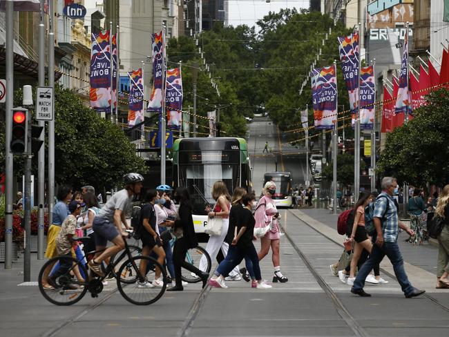 MELBOURNE, AUSTRALIA - NewsWire Photos JANUARY 12, 2020 : People cross Bourke Street Mall in Melbourne. Picture : NCA NewsWire / Daniel Pockett