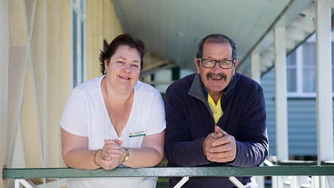 Principal Loretta White and groundsman Jeff Wilson on the veranda of the original building at Morayfield State School which is dated 1873.