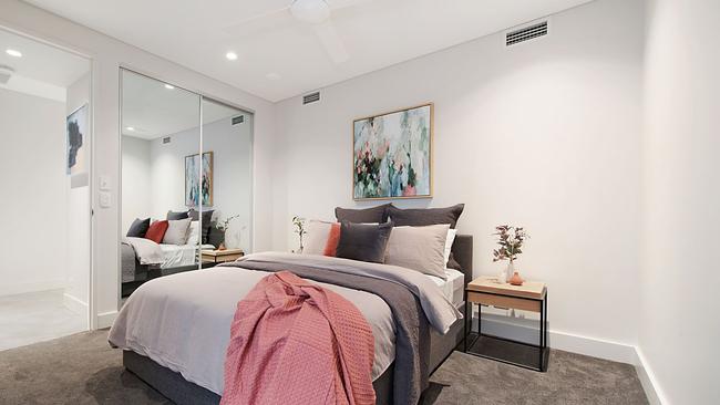 The bedroom in the new Bathers Beachside unit complex at Margate by Traders in Purple. 