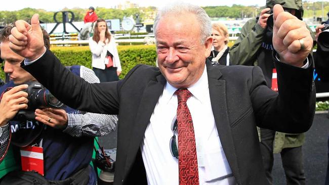 WET SUCCESS: Trainer John Shelton celebrates winning race 5, The Kosciuszko, with Belflyer at Royal Randwick Racecourse, in Sydney on Saturday. Picture: Mark Evans/Getty Images