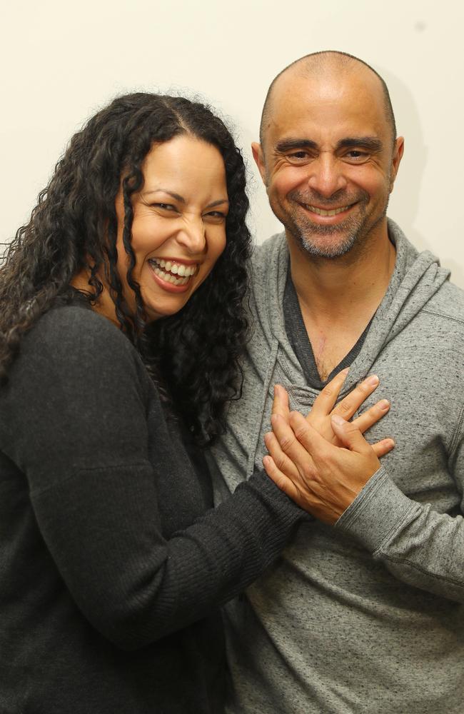 Anglesea dad Chris Liontos, with wife Connie shows his scar after open heart surgery. Picture: Alison Wynd