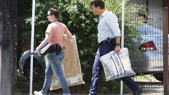 Police remove evidence from the home. Picture: David Caird Picture: David Caird