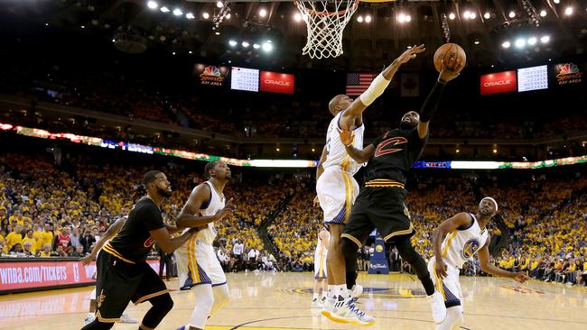 David West defends a shot by Kyrie Irving. Picture: AFP