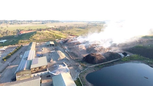 STILL SMOULDERING: AT the Lismore Recycling and Recovery Centre, 10m high piles of compost are still burning five days after a fire burned down the material recovery facility on Sunday August 11.