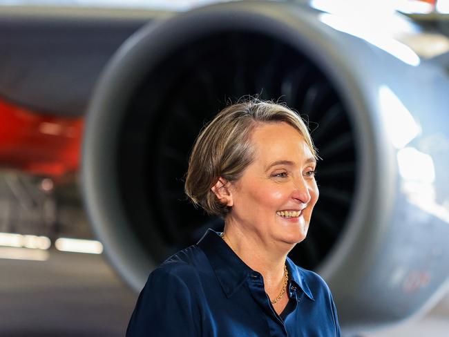 SYDNEY, AUSTRALIA - FEBRUARY 22: Qantas chief executive Vanessa Hudson speaks during a media opportunity at Hangar 96, Qantas Sydney Jet Base on February 22, 2024 in Sydney, Australia. Qantas has demonstrated a significant financial turnaround, reporting a record $2.47 billion profit for the 2022-23 fiscal year, marking a stark change from the previous year's $1.86 billion loss. The airline's strong performance was attributed to robust travel demand and high ticket prices, with domestic earnings before interest and taxes (EBIT) jumping to 18.2%, representing a 50% increase in profit margins over the past six years. The company's return on invested capital also increased to 103.6%, reflecting its improved financial position and operational performance. (Photo by Jenny Evans/Getty Images)