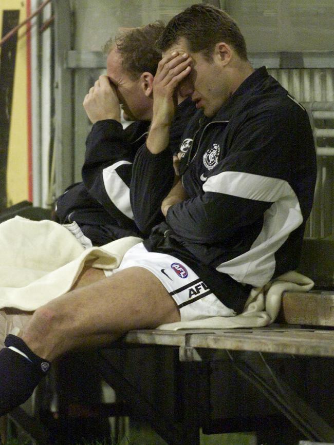 Anthony Koutoufides sitting on the bench following the injury.