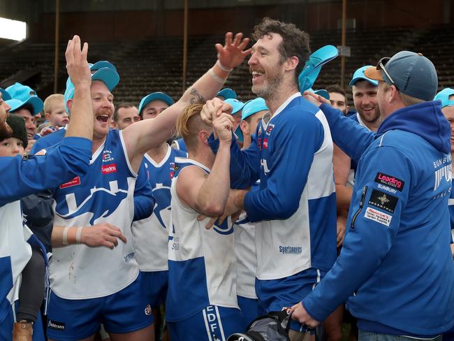 Brenton Sutherland is congratulated by teammates after claiming the medal for best afield. Picture: Mark Dadswell