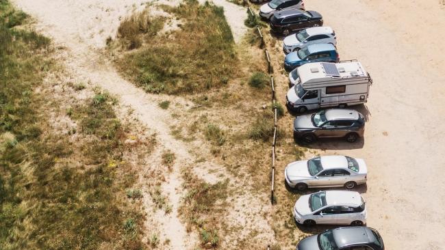 Always bring a couple of euros for parkingEspecially in summer, you can guarantee all the free spots near the beach on the road will be taken, and you'll have to park in one of the vacant land lots, where private landowners will typically charge you 2 euros (cash only, thrown in a bucket) for your troubles.