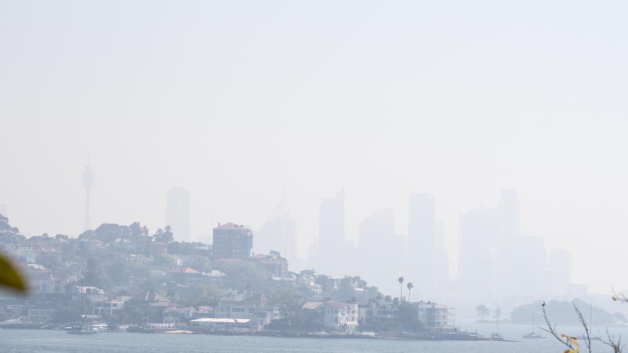 Hazard reduction burns caused a thick smog to settle on the city. Picture: NCA NewsWIRE/Monique Harmer.