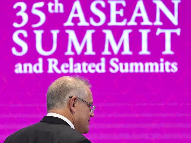 Australian Prime Minister Scott Morrison arrives during a family picture at the 14th East Asia Summit in Bangkok, Thailand, Monday, November 04, 2019. (AAP Image/Lukas Coch) NO ARCHIVING