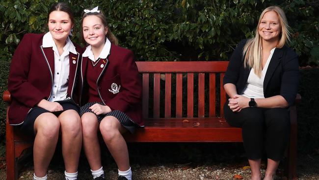 Sisters Claudia Johnston, Grade 10 with sister Scarlett Johnston, Grade 8 with teacher Courtney Blyth, one of the teachers they nominated. Picture: NIKKI DAVIS-JONES