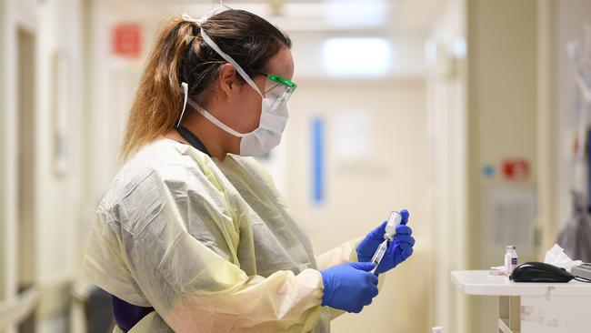 Healthcare worker Vanessa Chang in the coronavirus screening clinic at Cabrini private hospital. Picture: James Ross/AAP