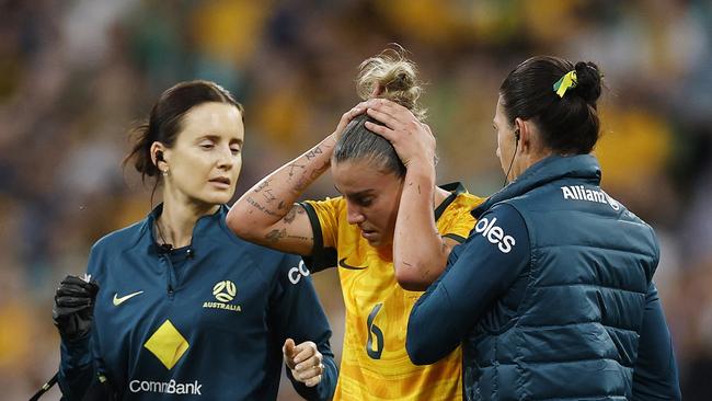 MELBOURNE, AUSTRALIA - DECEMBER 04: Chloe Logarzo of Australia reacts after a head clash with Chan Pi-Han of Chinese Taipei during the International Friendly match between Australia Matildas and Chinese Taipei at AAMI Park on December 04, 2024 in Melbourne, Australia. (Photo by Daniel Pockett/Getty Images)