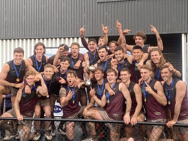 Old Haileybury win premiership in old fashioned mud-match