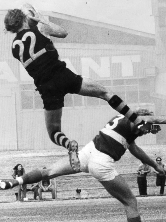 Stoneham takes a battering from a Neville Caldwell leap in 1973.
