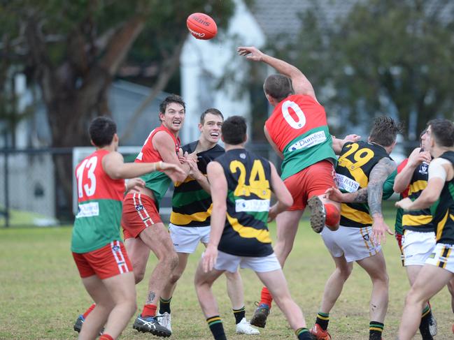 MPNFL Division 1 football: Pines v Dromana at Eric Bell Reserve, Frankston North. Pines #0 flies over the pack. Picture: AAP/ Chris Eastman