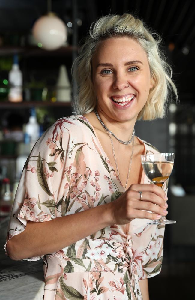 Pippa Walker samples the martini at Smoke Bar. Picture: Jonathan Ng