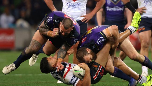 Asofa-Solomona about to drop on Suaalii. NRL Imagery