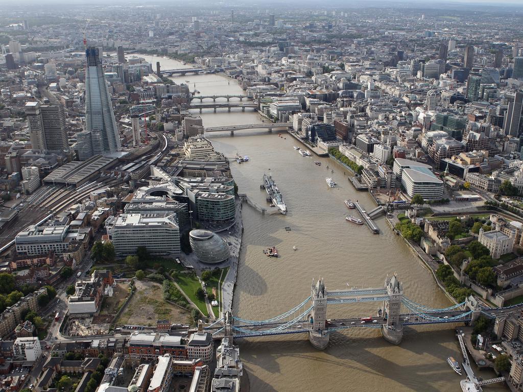 LONDON, ENGLAND - SEPTEMBER 05:  An aerial view of the Thames river in London from the air with the Shard and Tower Bridge in the foreground on September 5, 2011 in London, England.  (Photo by Tom Shaw/Getty Images)