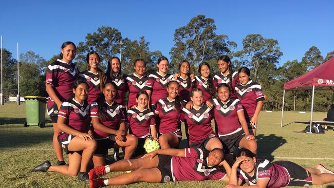 The Marsden SHS Year 7-8 team, including Lilly Lewis, holding light green head gear.