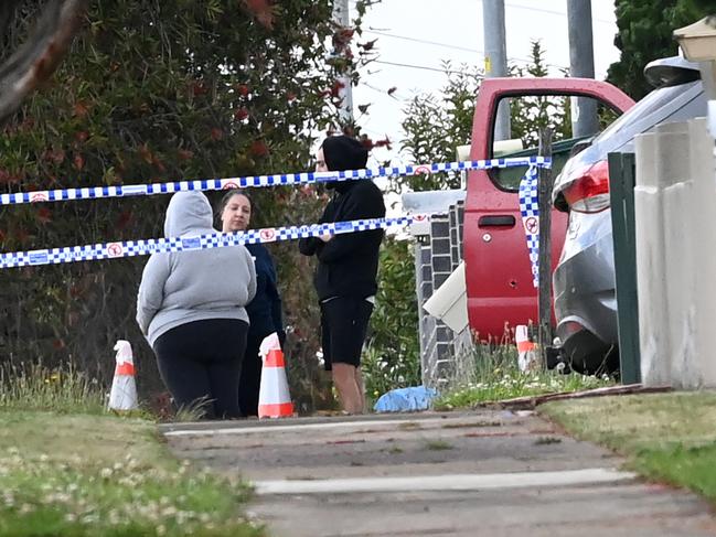 SYDNEY, AUSTRALIA - NewsWire Photos October 20 2021: A bullet can be seen in the door panel of a red car at the scene of the shooting deaths of two Hamze family members in Guildford this morning.Picture: NCA NewsWire / Jeremy Piper