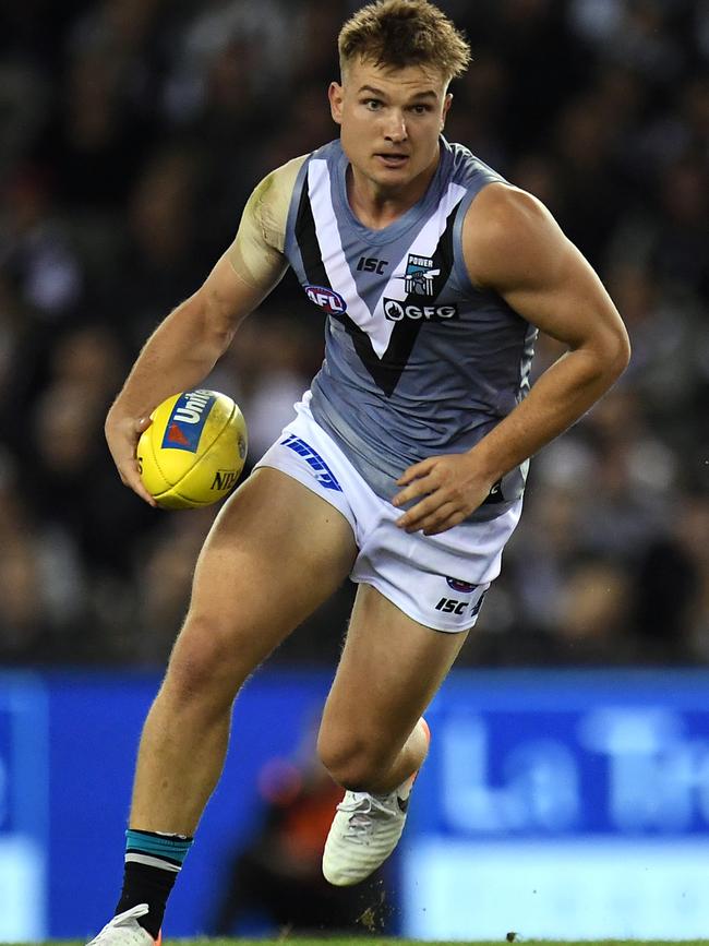 Ollie Wines in action against Collingwood last year. Picture: Julian Smith (AAP).