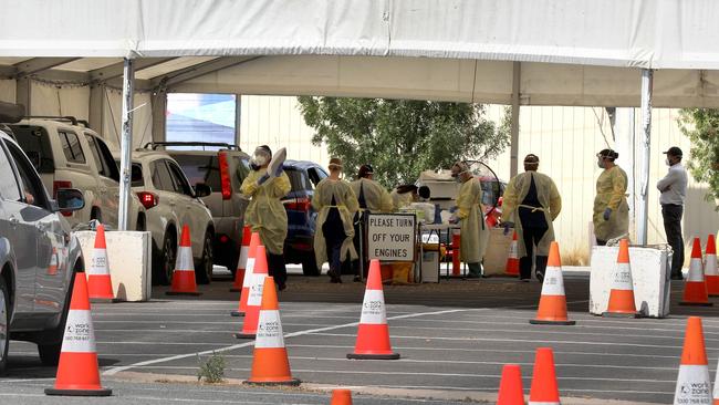 Cars line up at the Harts Mill Covid testing station at Port Adelaide on Wednesday. Picture Dean Martin