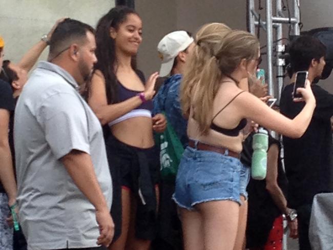 Malia Obama wears a crop top as she skips the Democratic National Convention to rock out at Lollapalooza. Picture: Splash