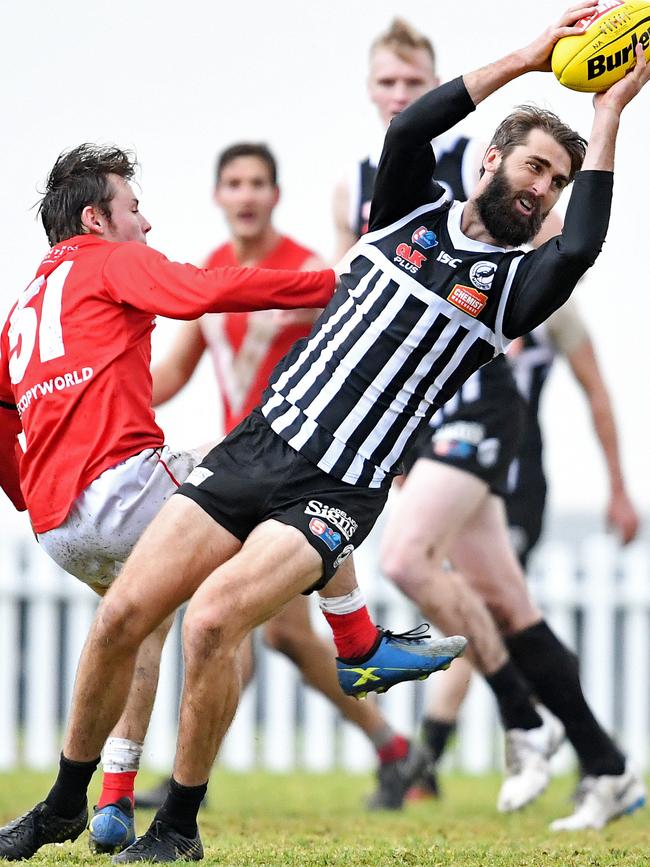 Port’s Justin Westhoff marks against North Adelaide in this year’s SANFL clash at Prospect Oval. Picture: Tom Huntley