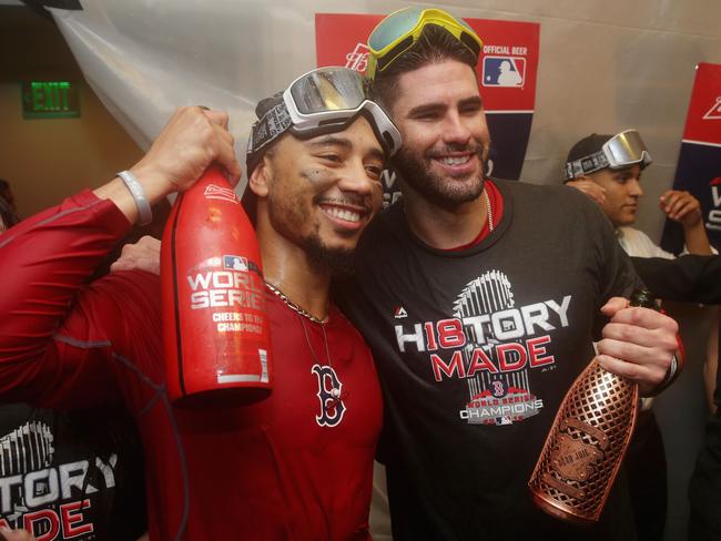 J.D. Martinez and Mookie Betts celebrate after their big win.