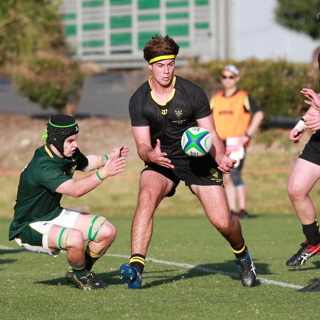 ohn Bryant pictured playing schoolboy rugby for St Laurence’s College in 2020.