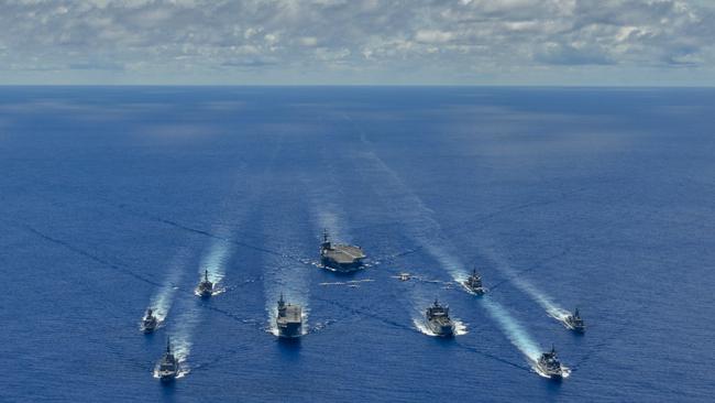 Australia, Japan and the US conduct a trilateral passage in the Philippine Sea on the way to participate in Exercise Rim of the Pacific (RIMPAC) in Hawaii.