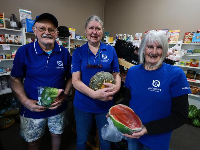 The supplied, donated by The Daily Telegraph, will be used to stock a local community pantry in Taree for flood victims. (Left to right) Volunteers Mick Brooks, Debbie Burham and Lyn Iverson from Global Care. Picture: Scott Calvin